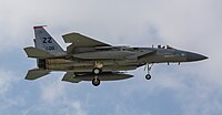 A US Air Force F-15C Eagle, tail number 83-0011, on final approach at Kadena Air Base in Okinawa, Japan. The aircraft is assigned to the 67th Fighter Squadron.