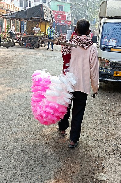 File:A man selling cotton candy.jpg