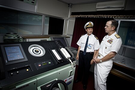 Tập_tin:US_Navy_070621-N-0696M-217_Chief_of_Naval_Operations_(CNO)_Adm._Mike_Mullen_receives_a_tour_of_a_ship_simulator_from_Vietnamese_Maritime_University_Vice_President_Dinh_Xuan_Mahn.jpg