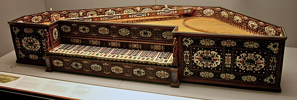 A sumptuously decorated pentagonal spinet from 1577 by Annibale dei Rossi; 49 keys