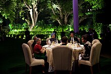 Manmohan Singh and Gursharan Kaur, hosting Barack Obama and Michelle Obama, at their residence on 7 November 2010. Seated at the table are Rahul Gandhi to the left of Mrs. Obama and unseen to her right, Sonia Gandhi, both from the family of former prime minister Rajiv Gandhi. Barack and Michelle Obama attend a dinner hosted by Manmohan Singh and Mrs. Gursharan Kaur at the Prime Ministers residence in New Delhi, Nov. 7, 2010.jpg