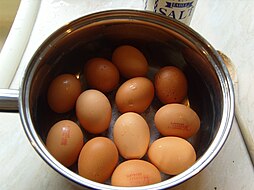 Boiled eggs in saucepan by Sarah McCulloch.jpg