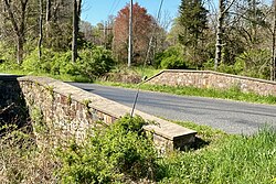 Bowne Station Road stone arch bridge over tributary of the Alexauken Creek, Bowne, NJ.jpg