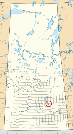 Peta provinsi Saskatchewan menampilkan 297 kota pedesaan dan ratusan kecil India cadangan. Salah satu yang disorot dengan lingkaran merah.