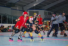 A Charm City All Stars (Baltimore, Maryland) blocker vs. a Rhode Island Riveter (Providence, Rhode Island) jammer (2008) CharmvsRivet2639463631 aee9fd553e.jpg