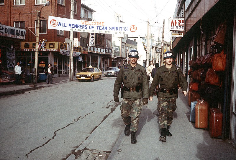 File:DF-ST-82-06496 Security policemen patrol a street of Son Tan Up during exercise Team Spirit '81.jpeg