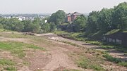 Thumbnail for File:Dudley station site and freight terminal following the clearance of vegetation for the metro extension, a new light rail test centre and for freight traffic .jpg