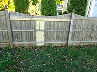 Feb 2015 Fence repair project shoring up weak braces adding new slats.JPG