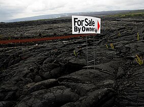 Kalapana in 2008 with an active lava flow at background