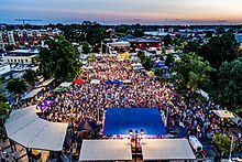 Thousands gather for a Freeboot Friday concert in Uptown.