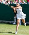 Gabriella Taylor competing in the first round of the 2015 Wimbledon Qualifying Tournament at the Bank of England Sports Grounds in Roehampton, England. The winners of three rounds of competition qualify for the main draw of Wimbledon the following week.