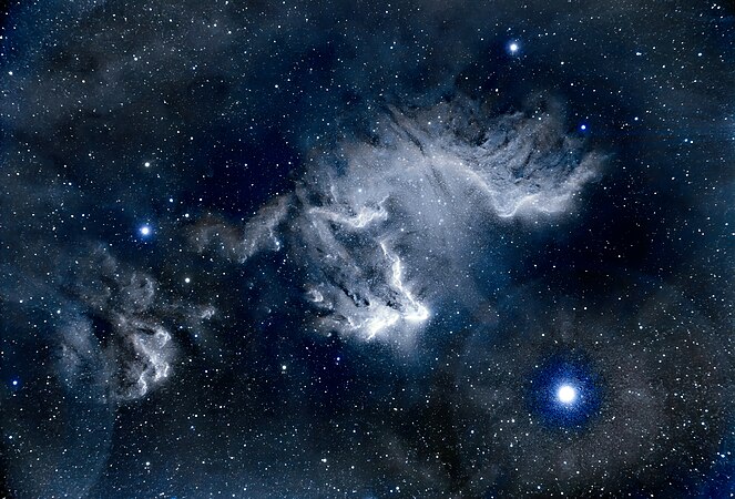 Gamma cas nebula, that is strikingly illuminated by the bright blue star Gamma Cassiopeiae, observed in the bottom right quadrant in the image. Photo by Ram Samudrala