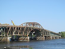 The General Sullivan Bridge in June 2013, with the Ruth L. Griffin Bridge under construction (yellow crane) General Sullivan Bridge (June 2013).jpg