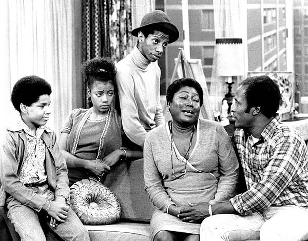 On Good Times (1974), L–R: Ralph Carter, BernNadette Stanis, Jimmie Walker, Esther Rolle, and John Amos