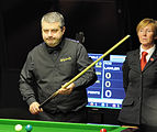 Deutsch: Bild aufgenommen in Berlin während des German Masters im Snooker 2014. Hilde Moens, Marcus Campbell. English: Picture taken in Berlin during the Snooker German Masters in 2014. Hilde Moens, Marcus Campbell.