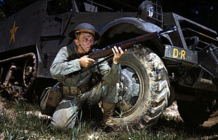 World War II-era American infantryman with a haversack at his hip hanging from a shoulder strap Infantryman in 1942 with M1 Garand, Fort Knox, KY.jpg