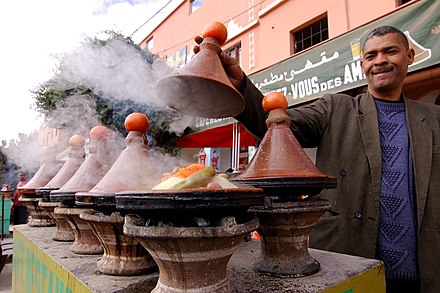 Tagines slow-cooking on a Moroccan street