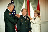 Maj. Gen. Frederick E. Vollrath is pinned with the rank of lieutenant general by his wife Joy and chief of staff of the Army, Gen. Dennis J. Reimer, on September 30, 1996. Major General Frederick E. Vollrath is promoted to Lieutenant General DA-SC-01-06529 (6511014).jpg