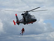 Offshore rescue by French Navy Dauphin helicopter
