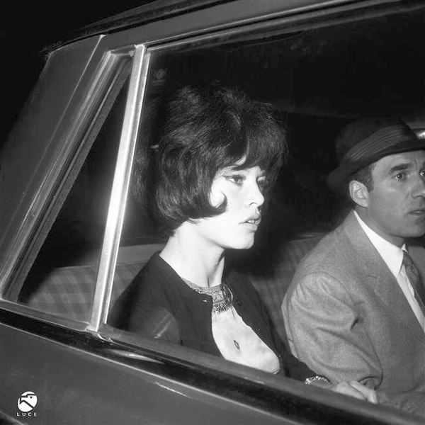 Brigitte Bardot and Michel Piccoli caught by paparazzi in Italy during the filming of Contempt in 1963