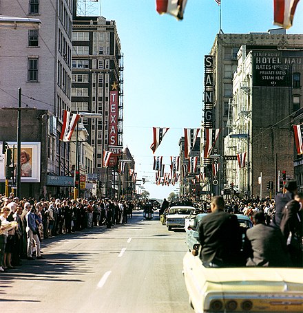 President Kennedy's motorcade on Main Street, approaching Dealey Plaza