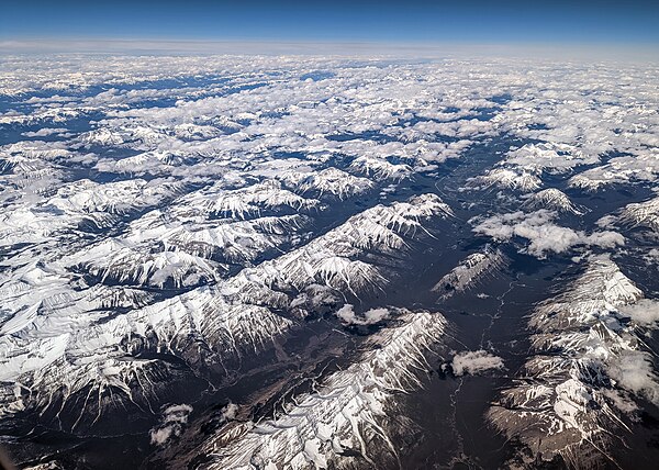 Mountains around Banff, with Spray River flowing north to the Bow River at Banff (a small cloud obscures Banff itself)