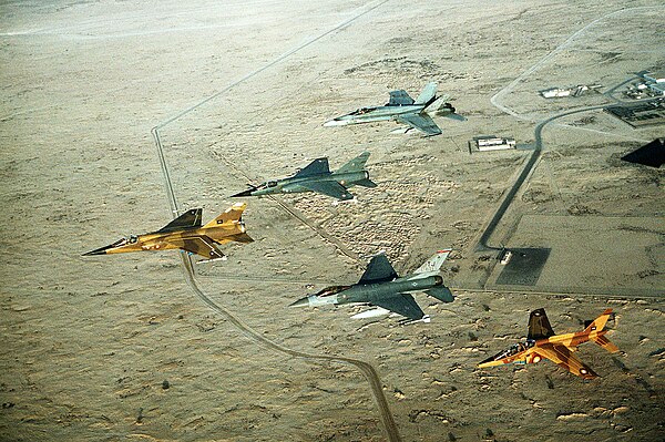 Multinational group (Qatari F1 Mirage & Alpha Jet, French F1 Mirage, U.S. F-16, and Canadian CF-18 Air Forces) of fighter jets during Operation Desert