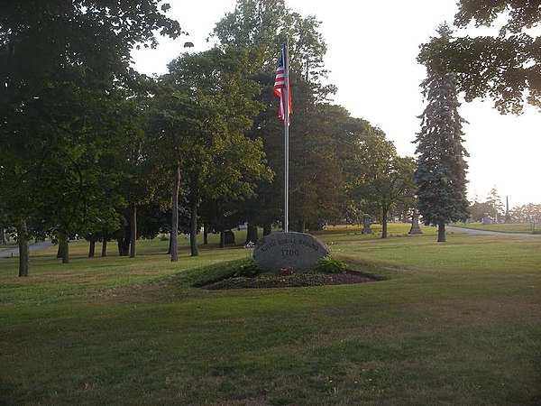 Entry flag and marker to North Burial Ground