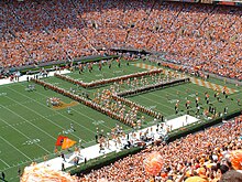 The Pride of the Southland is in formation while the UT team runs the T. Openingt.jpg