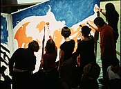 Participants paint one frame of The 1 Second Film's animation during a party. Painting frame.jpg