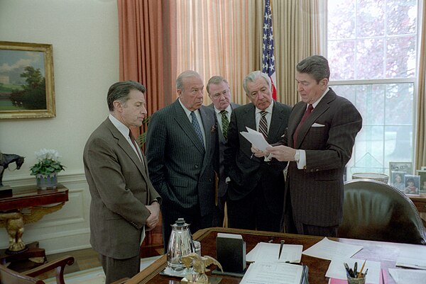 Reagan (far right) meets with (left to right) Secretary of Defense Caspar Weinberger, Secretary of State George Shultz, Attorney General Ed Meese, and