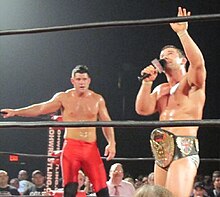 Davey Richards (right) after winning the ROH World Championship from Eddie Edwards; the two competed again for the championship in their third singles match ROH Champ Davey.jpg