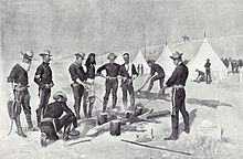 United States Cavalry soldiers preparing roast beef for Christmas dinner in their camp in 1892 RemingtonUSCavalryChristmasBeefRoast.jpg