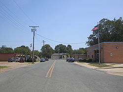 Downtown Cotton Valley with United States Post Office at the right and municipal building at the left