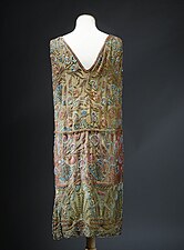 Egyptian influences – Dress with lotus flowers inspired by Ancient Egyptian decoration, by Jenny (couturier) and Lesage (embroiderer) (1925), silk, metallic thread, and crocheted embroidery, Musée Galliera, Paris