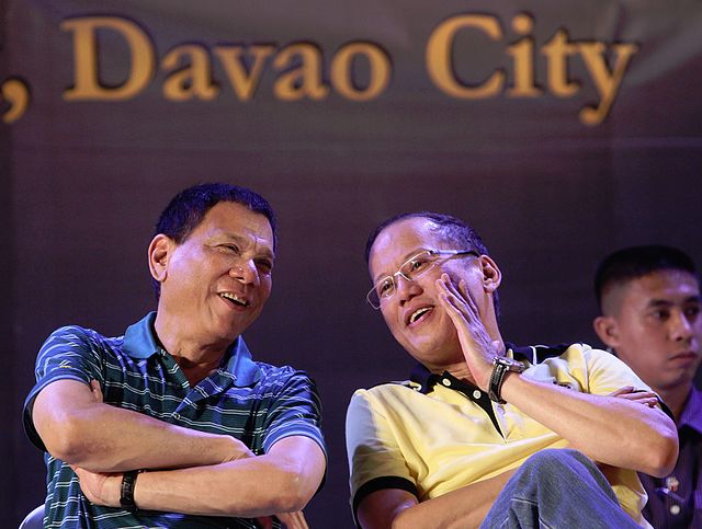 Mayor Duterte (left) with President Benigno Aquino III during a meeting with local government unit leaders in Davao City in 2013