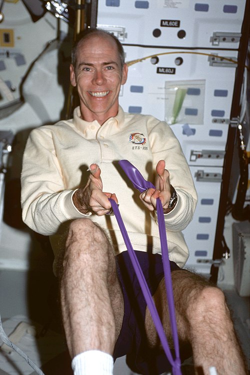 Barry exercises during the STS-105 mission.