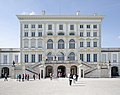 * Nomination Nymphenburg palace, main entrance.--Peulle 11:24, 28 October 2018 (UTC) Tilted or needs a horizontal perspective correction IMO --Trougnouf 12:40, 28 October 2018 (UTC)  Done Thanks for reviewing. I have done another rework from the RAW file; every line that should be straight, now is. Note that the horizontal line below the roof is not completely level in real life. I also discovered that when shooting this image, I did not stand precisely in the middle, but slightly to the left. Dang.--Peulle 21:40, 28 October 2018 (UTC)  Support It looks straight now, but there is a huge difference in width between the two so one of them isn't very accurate. They both look good to me so it's up to you to do whatever looks like real life. Not being right in front of a monument isn't a big deal with modern software, I uploaded File:Tour Burbant, Ath without perspective correction (DSCF8179).jpg to illustrate this, the corrected version is File:Tour Burbant, Ath (DSCF8179).jpg and it was very easy to correct with its straight lines (much like the building you nominated here) --Trougnouf 19:46, 29 October 2018 (UTC) * Promotion {{{2}}}