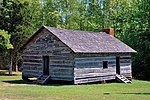 Reconstruction of Shiloh Church at Shiloh National Military Park, 2006. Battery E was located across a ravine adjacent to this church. Shiloh Church.jpg