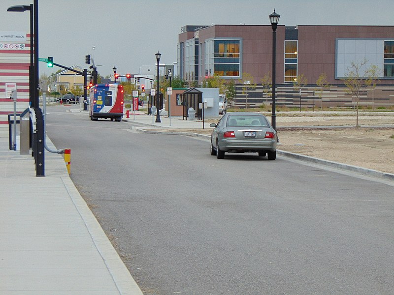 File:South across Grandville Ave at Daybreak Parkway station bus stand, Apr 16.jpg