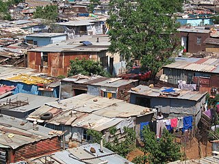 Shanty town a settlement of plywood, corrugated metal, sheets of plastic, and cardboard boxes