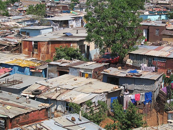 The music video was filmed in Johannesburg, South Africa. In it, images of poverty of the city (an urban area pictured) are shown.