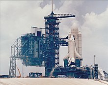 Enterprise mated to External Tank and dummy SRBs stands on Kennedy Space Center Pad 39A during fit check tests twenty months prior to STS-1. Space Shuttle Enterprise on LC39A.jpg