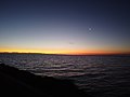 * Nomination The sun sets at a beach/dock in Melbourne, Victoria. A crescent moon is seen near the horizon. --Dimitrijemat 00:06, 3 March 2023 (UTC) * Decline  Oppose Tho photo is underexposed (the left bottom corner is a pure darkness), very grainy (owing to ISO speed, I guess) --Draceane 12:22, 3 March 2023 (UTC)