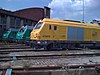 An SNCF Infra locomotive and two other SNCF locomotives at Haute-Picardie station in 2009