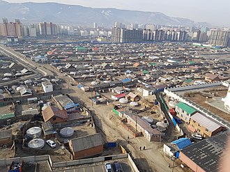 The private sector with yurts against the backdrop of high-rise new buildings in Ulaanbaatar. The private sector with yurts against the backdrop of high-rise new buildings in Ulaanbaatar.jpg