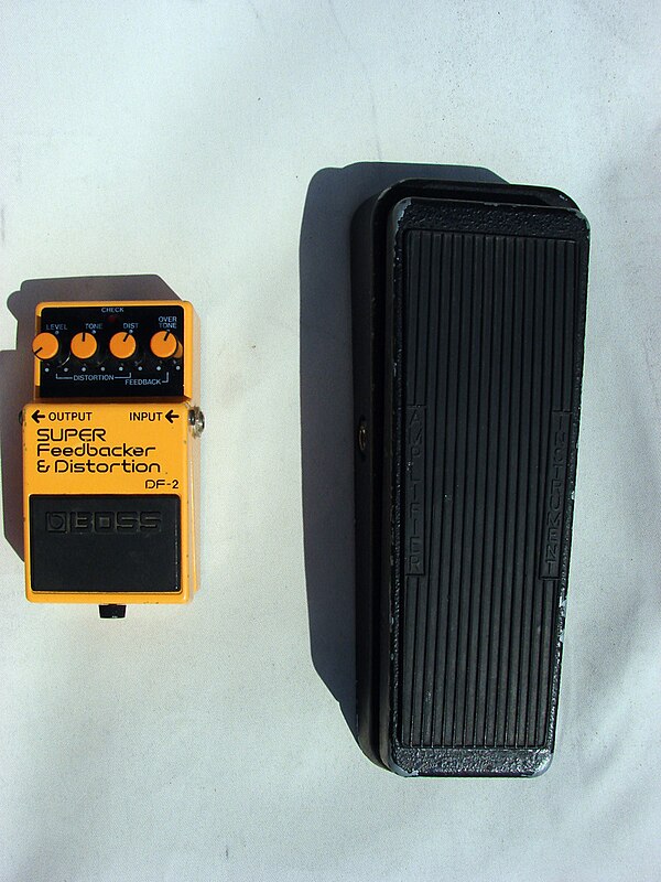 The Boss DF-2 Super Feedbacker and Distortion pedal (on the left) helps electric guitarists to create feedback effects.