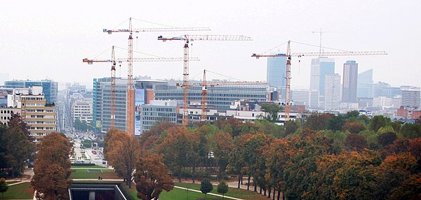 The EEAS main building under construction in 2007, as seen in the distance across the Parc du Cinquantenaire in Brussels, Belgium