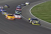 US_Navy_040501-N-1336S-037_The_U.S._Navy_sponsored_Chevy_Monte_Carlo_NASCAR_leads_a_pack_into_turn_four_at_California_Speedway.jpg