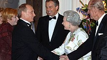 Putin and his wife Lyudmila meeting with Queen Elizabeth II, her husband Prince Philip, Duke of Edinburgh, and Prime Minister Tony Blair in 2005 Vladimir Putin and Prince Philip.jpg